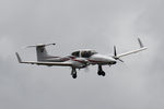 C-FSGM @ CYXX - On final for 19 with and engine out. Winds gusting a bit over 60kph at the time. - by Guy Pambrun