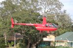 N277RK @ 7FL6 - Robinson R44 II