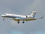 N940AJ @ EKCH - Landing on RWY22L - by Lars Baek