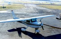 N4932H @ S43 - Harvey Field with N4932H in 1985, with old gas pumps in center of ramp - by Mark Peterson