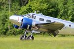 N223CM @ LFFQ - Beech D18S, Landing, La Ferté-Alais airfield (LFFQ) Airshow 2015 - by Yves-Q