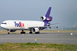 N582FE @ LFPG - at cdg - by Ronald