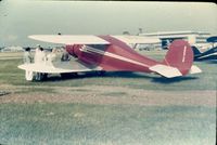 N5074N @ FFO - A picture taken of the N5074N Staggerwing Beech at a Wright-Patterson AFB air show circa 1962. I scanned it circa 2012. - by Orville E. Halley