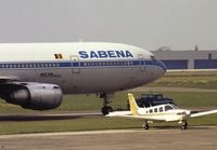 OO-SLC @ EBBR - Walking a DC EBBR taxiway A scan from slide - by j.van mierlo