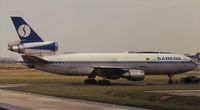 OO-SLC @ EBBR - Walking a DC10 EBBR taxiway A scan from slide - by j.van mierlo