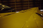 PH-BUN @ EHAM - Starboard wing of KLM Boeing 747-206B in a KLM hangar at Schiphol-Oost, 1983