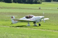 HB-YMD @ LSZO - After pull up a glider is he landing - by Martin Thut