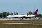 N908DN @ PBI - taxiing at PBI - by Bruce H. Solov