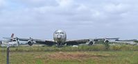 J5-GGU @ HKMO - Tail cut off. In sad shape. - by David Trupe