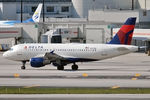 N317NB @ KMIA - Taxiing out for departure - by Robert Kearney