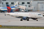 N344NB @ KMIA - Taxiing in after arrival - by Robert Kearney