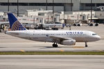 N840UA @ KMIA - Taxiing in after arrival