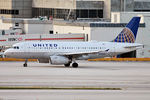 N853UA @ KMIA - Taxiing out for departure