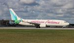 9Y-TAB @ KMIA - Caribbean 737-800 - by Florida Metal