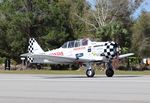 N991GM @ 7FL6 - North American AT-6C - by Mark Pasqualino