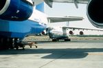 UN-76499 @ OMSJ - Euro-Asia Air Il76 hiding behind Polet An124 - by FerryPNL
