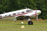 N2913B @ LFFQ - Beech D18S, Taxiing to parking area, La Ferté-Alais airfield (LFFQ) Air show 2016 - by Yves-Q