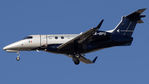 XA-BPS @ KAUS - Embraer Phenom landing on 17L - by Caden Glasgow