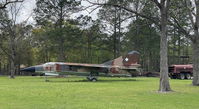 20 24 - MiG-23 in field just north of Holt, FL. - by Michael Steadman