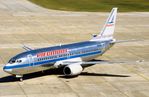 N306P @ KIAH - Piedmont B733 - by FerryPNL
