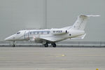 M-ASER @ LOWW - private Embraer EMB-505 Phenom 300E - by Thomas Ramgraber