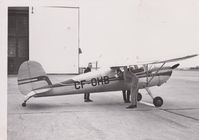 CF-OHB - Second photo shown in front Canadian Air Force Hanger.
First Photo of Self doing a preflight. - by Airman Pelly USAF, in first photo far side of airplane.