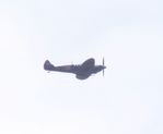 G-PTIX - Past Potters Bar, Herts out of North Weald Essex. Also designated as PT879. A very distant shot but the only photo of this 'Russian' Spitfire on A-D. Restored from crash wreckage recovered from Murmansk the only flying Spitfire in its 1944 Russian livery. - by Chris Holtby