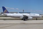 N425UA @ KORD - Airbus A320-232
