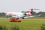 F-HMLJ @ LFRB - Bombardier CRJ-1000EL NG, Reverse thrust landing rwy 25L, Brest-Bretagne Airport (LFRB-BES) - by Yves-Q