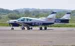 G-RCED @ EGFH - Two Commander 114 aircraft, G-RCED with G-TECH. - by Roger Winser