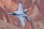 169115 - NIGHT32 VFA-143 Pukin Dogs, wingman following through Star Wars Canyon - by Topgunphotography