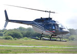 G-BYBI @ EGFH - Visiting Jet Ranger III operated by Adventure 001.  - by Roger Winser