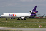 N582FE @ LFPG - at cdg - by Ronald