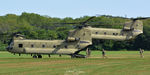 10-08802 - Loading up one Chinook with jumpers as the next one comes in to land. - by Topgunphotography