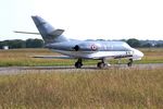 32 @ LFRJ - Dassault Falcon 10 MER, Taxiing to rwy 26, Landivisiau Naval Air Base (LFRJ) - by Yves-Q