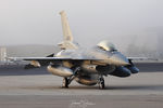 1633 @ KPSM - New Iraqi F-16 awaits the fog to clear to take off and be delivered to the Iraqi AF. - by Topgunphotography