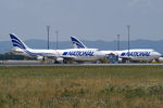 N702CA @ LOWW - National Airlines Boeing 747-412(BCF) + N756CA - by Thomas Ramgraber
