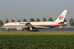 9M-MRB @ EHAM - at spl - by Ronald