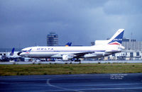 N736DY @ KLAX - from the Imperial Terminal at LAX January 1998 - an Intl L-1011 from Delta rolling out on 25L for the cross-over. - by Tom Vance