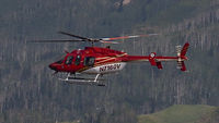 N7160V - Very attractive heli captured before a summertime landing near the Steamboat Springs Ski Area. - by Arnold Bookheim Jr.