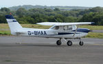 G-BHAA @ EGFH - Visiting Cessna 152 about to depart. - by Roger Winser