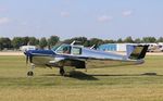N5256C @ KOSH - Beech B35