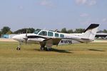 N1879L @ KOSH - Beech 58TC - by Mark Pasqualino