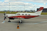 N500LU @ EKCH - Airplane parked in the south of the airport - by Lars Baek