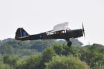 G-AREI @ EGFH - Visiting ex-AAC Auster AOP.3 aircraft MT438 in WW2 SEAC camouflage and markings departing Runway 28. - by Roger Winser