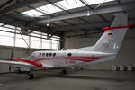 D-IGEL @ EDVY - Beechcraft Super King Air B200GT inside a hangar at Porta Westfalica airport, Germany, 2021 - by Van Propeller