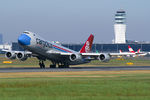 LX-VCF @ LOWW - Cargolux Boeing 747-8R7(F) Not without my mask - livery - by Thomas Ramgraber