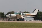 N977V @ KOSH - Beech C55 - by Mark Pasqualino