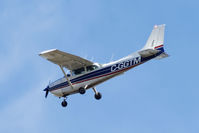 C-GGTM @ YQR - Coming in for a landing. - by Don Johnston