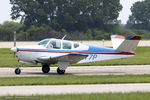 N277P @ KOSH - Beech F35 Bonanza  C/N D-4230, N277P - by Dariusz Jezewski www.FotoDj.com